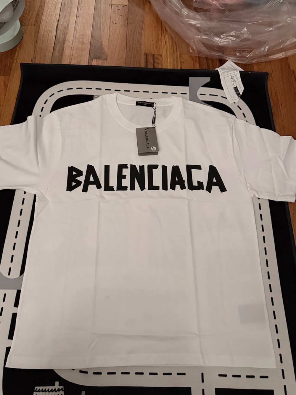 White Short-Sleeve Logo Tee with Black Lettering